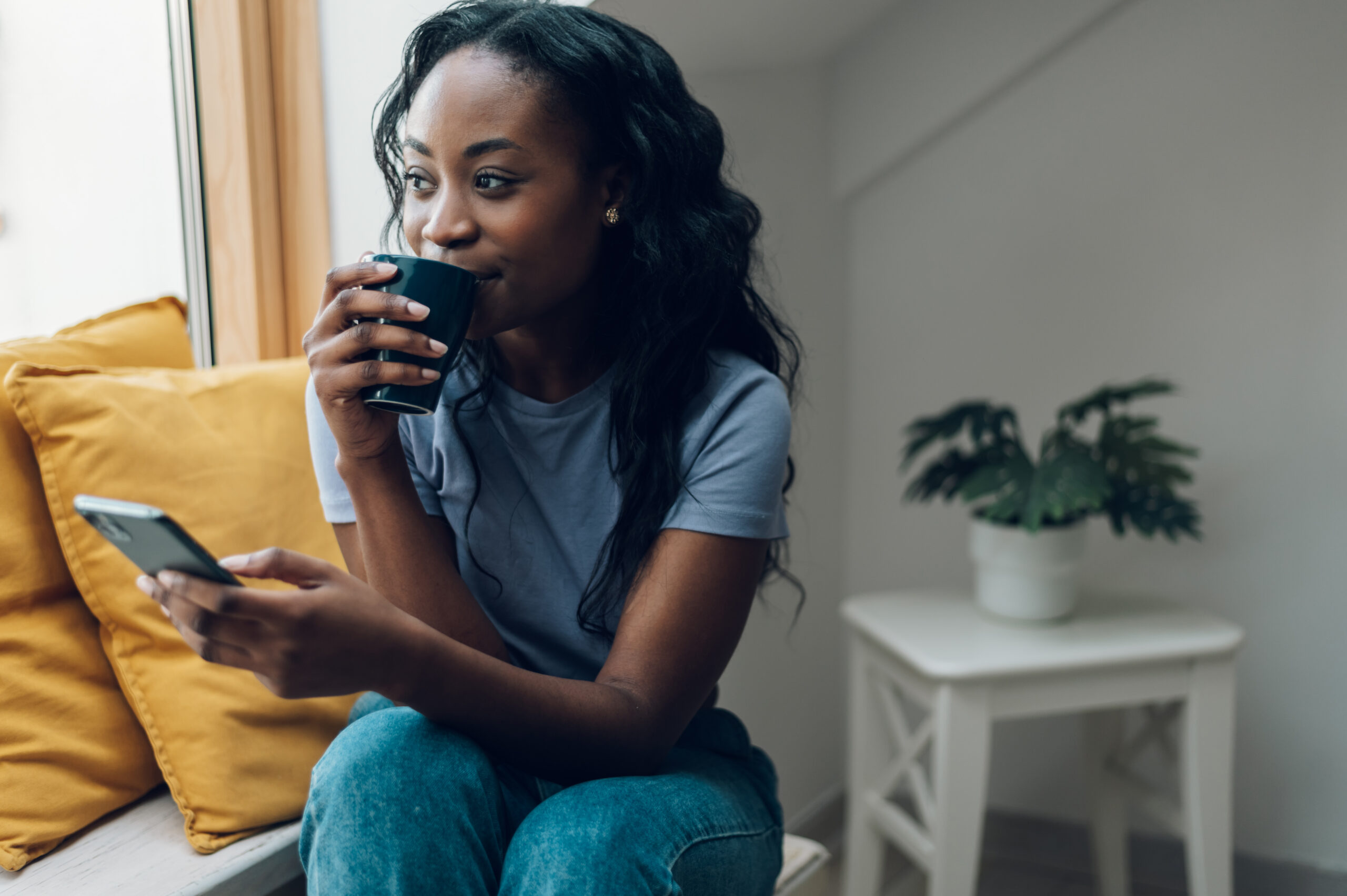 Woman drinking a hot drink